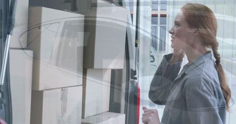 Courier Using Smartphone with Packages and Financial Charts Overlay