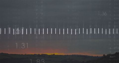 Digital Interface Overlays Countryside During Sunrise