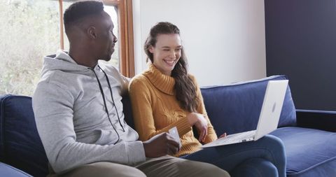 Happy Couple Shopping Online from Sofa with Laptop - Download Free Stock Images Pikwizard.com