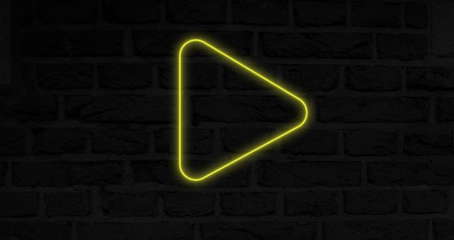 Neon Play Icon Glowing Over Brick Wall Background - Download Free Stock Images Pikwizard.com