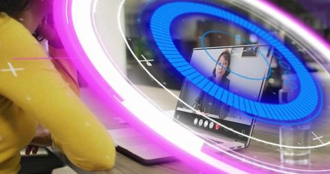 Woman attending virtual meeting with neon ar interface on laptop for remote collaboration