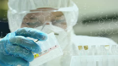 Scientist Analyzing Samples with Chemical Structures Overlay