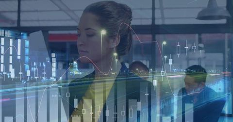 Businesswoman Analyzing Financial Data Hologram in Office - Download Free Stock Images Pikwizard.com