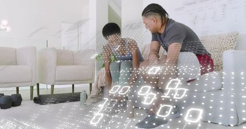 Friends preparing for home workout tying shoelaces and sharing encouragement and motivation