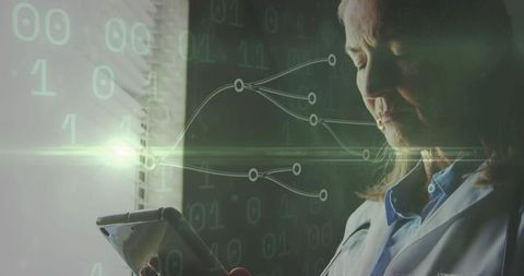 Senior scientist engaged with technology for data analysis