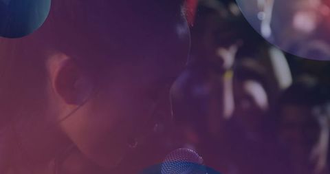 Female singer performing live at animated concert