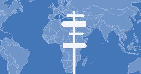 Blank road sign against world map on blue background