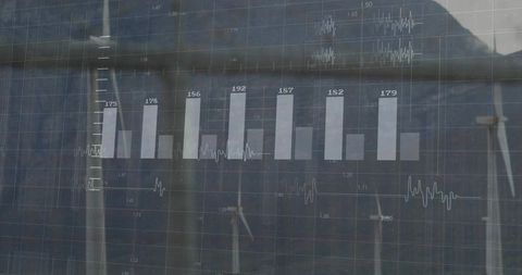 Displaying energy analytics overlay on glass with labeled bar chart and wind turbines