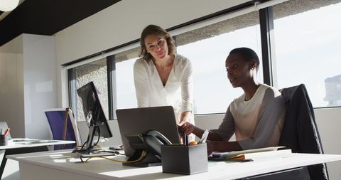 Diverse Female Colleagues Collaborating in Modern Office - Download Free Stock Images Pikwizard.com