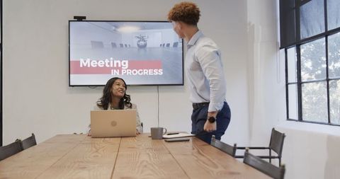 Business Team Collaborating During Conference Meeting