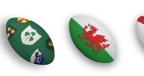 Rugby Balls with National Flags Over White Background