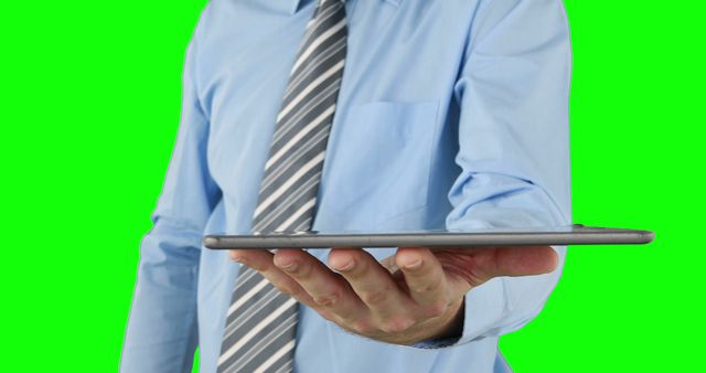 Businessman Presenting Digital Tablet on Green Screen Background - Download Free Stock Images Pikwizard.com