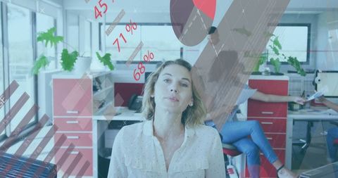 Businesswoman Analyzing Data in Modern Digital Office