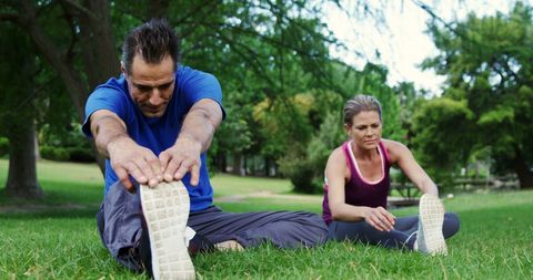 Middle-aged Couple Stretching Exercises in Park for Health - Download Free Stock Images Pikwizard.com