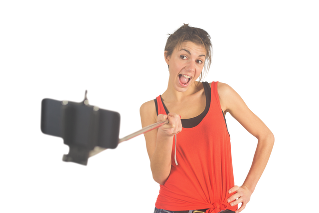 Cheerful Woman Posing with Selfie Stick on Transparent Background - Download Free Stock Videos Pikwizard.com