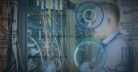 IT Technician Analyzing Data Server with Digital Interface - Download Free Stock Images Pikwizard.com