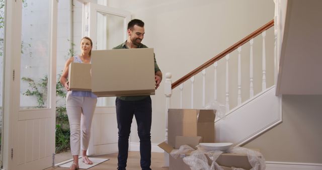 Couple Moving Boxes Into New Home - Download Free Stock Images Pikwizard.com