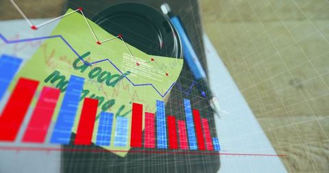 Camera lens resting with sticky note and overlaid red-blue bar charts for data visualization