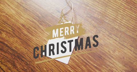 Rustic christmas tag on wooden table