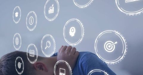 Boy Leaning with Hand on Neck Surrounded by Futuristic Digital HUD Icons for Learning
