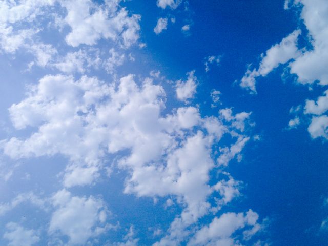 Clear Blue Sky with Fluffy White Clouds on a Sunny Day - Download Free Stock Photos Pikwizard.com