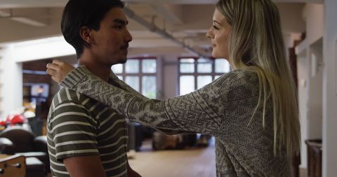 Couple Embracing in Cozy Living Room Interior