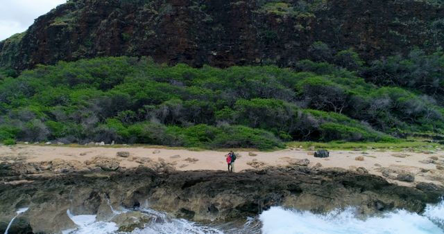 Solo Hiker Exploring Rugged Coastal Terrain - Download Free Stock Images Pikwizard.com