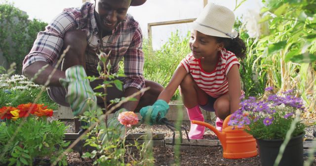 Father and Daughter Bonding while Gardening Outdoors on a Sunny Day - Download Free Stock Images Pikwizard.com