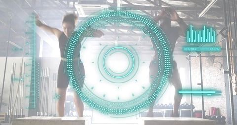 Two athletes performing box jumps with holographic ar fitness interface in warehouse gym