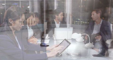 Corporate Professionals Collaborating in Modern Nighttime Office - Download Free Stock Images Pikwizard.com