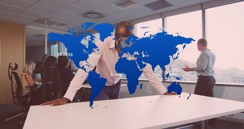 Businessman Analyzing World Map in Modern Office