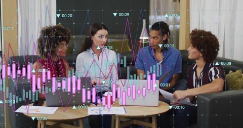 Diverse team collaborating with digital graph overlay in modern office