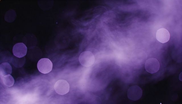 Drifting purple mist with neon bokeh orbs and hexagonal light spots in dark void