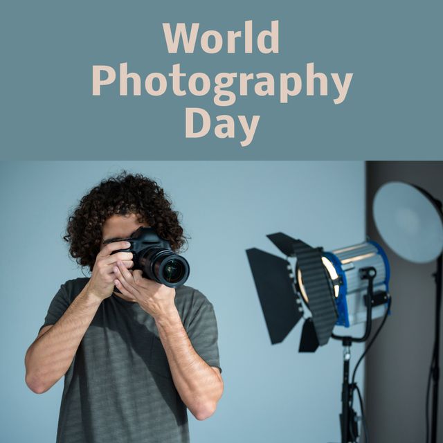 World Photography Day Celebrating Male Photographer with Camera in Studio - Download Free Stock Templates Pikwizard.com