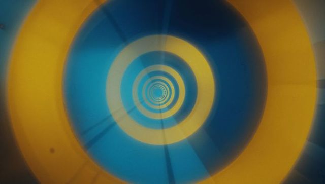 Abstract Spiraling Blue and Yellow Circular Tunnel Art