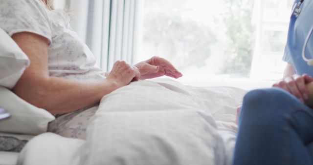 Elderly Patient Receiving Care from Nurse at Bedside - Download Free Stock Images Pikwizard.com