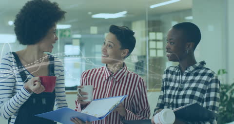 Diverse Coworkers Collaborating with Digital Interface at Office