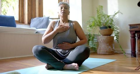 Senior Woman Practicing Mindful Meditation at Home