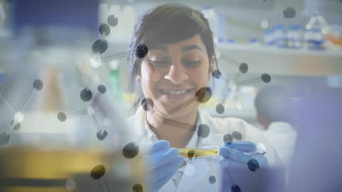 Joyful Scientist Analyzing Sample in Modern Laboratory