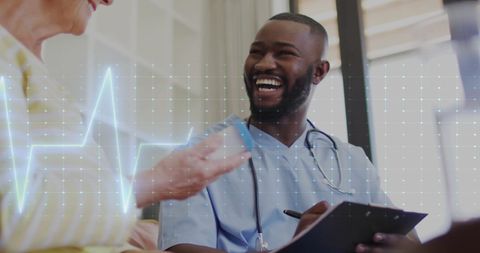 Nurse Interacting with Elderly Woman in Healthcare Setting