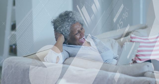 Senior Woman Relaxing and Using Tablet with Futuristic Infographics Overlay - Download Free Stock Images Pikwizard.com