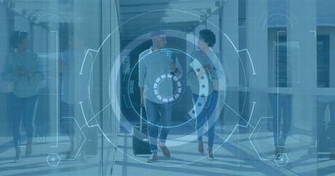 Modern business travelers walking in high-tech airport corridor