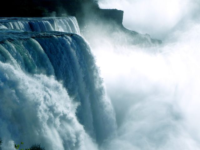 Majestic Waterfalls Cascading with Mist in Scenic Landscape - Download Free Stock Photos Pikwizard.com