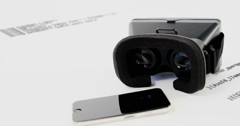 VR Headset Resting on Mobile Phone with Digital Data Graphics - Download Free Stock Images Pikwizard.com