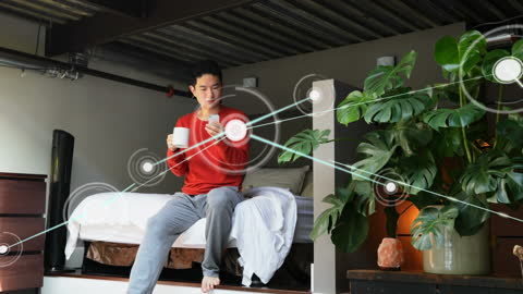Man with Digital Connections in Modern Loft Space