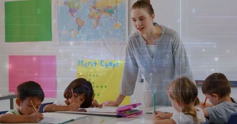 Teacher Guiding Young Students in Creative Classroom Activity