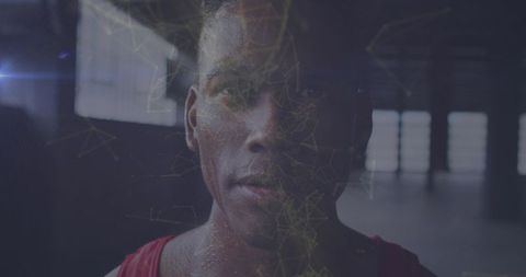 Athletic Man Visualizing Future of Fitness with Digital Networks