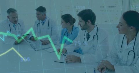 Medical Team Collaborating on Patient Analytics Dashboard During Clinical Conference