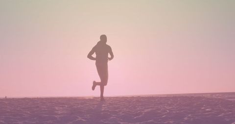 Silhouette of Runner on Beach During Sunrise - Download Free Stock Images Pikwizard.com