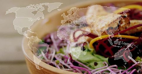 Natural Ingredients in Wooden Bowl with World Map Overlay